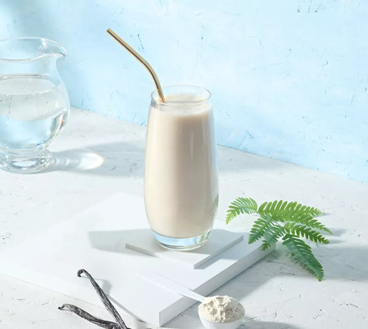 Herbalife Formula 3 Personalised Protein Powder with a straw on a white surface with a light blue background
