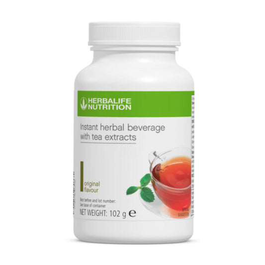 Herbalife Instant Herbal Beverage Original Flavour Large 102g Green Tea, Orange Pekoe Black Tea, Malva Flower, Hibiscous Flower and Cardomom seed beverage container with cup of tea. 